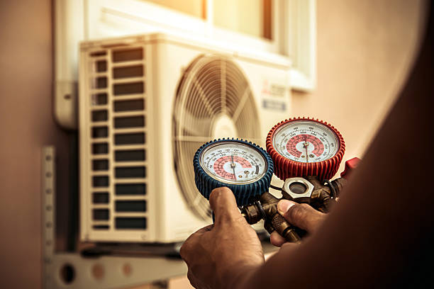 Professional Ac Installation technician working in Port Salerno, FL